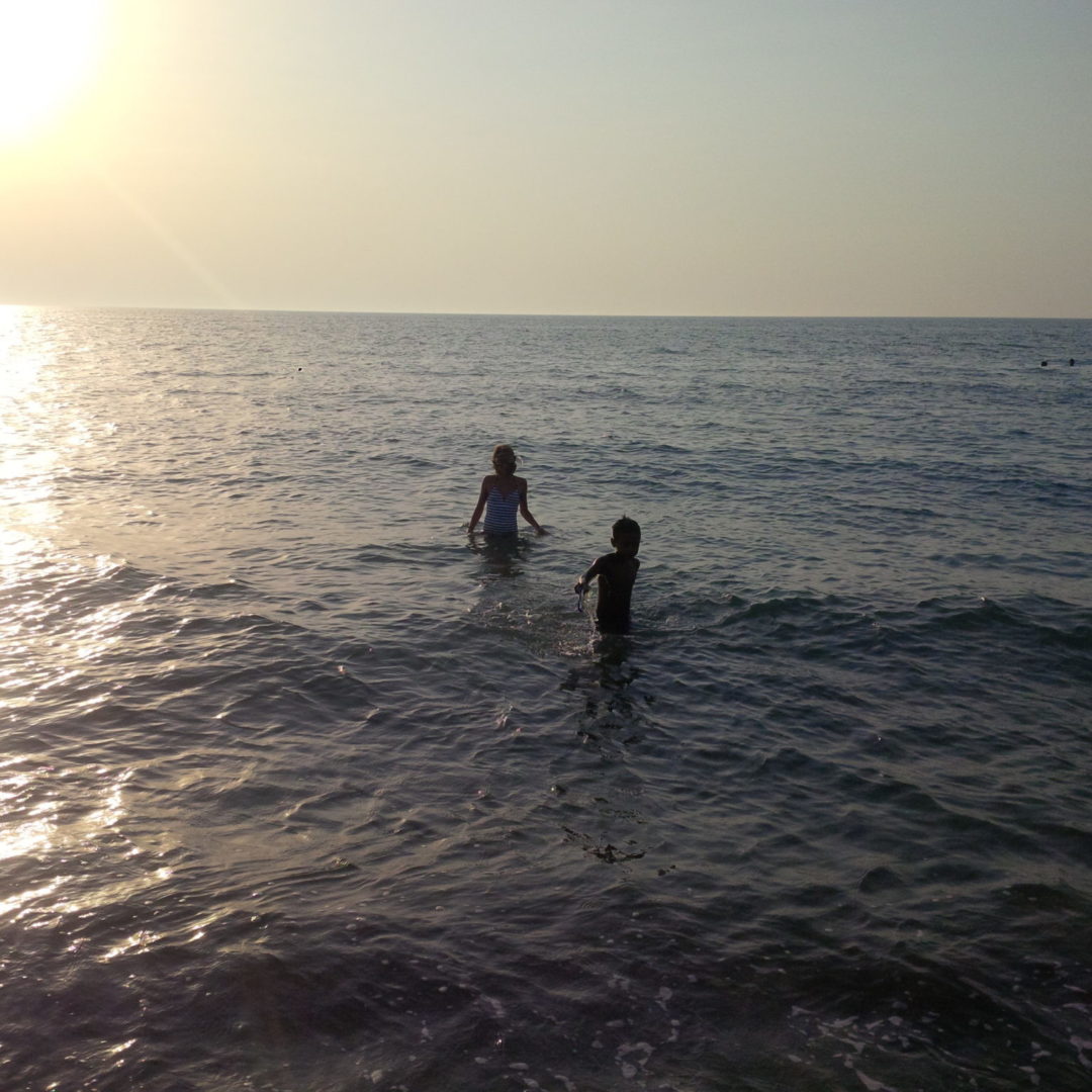 Things to do in Paphos- Sunset swimming at Argaka Beach