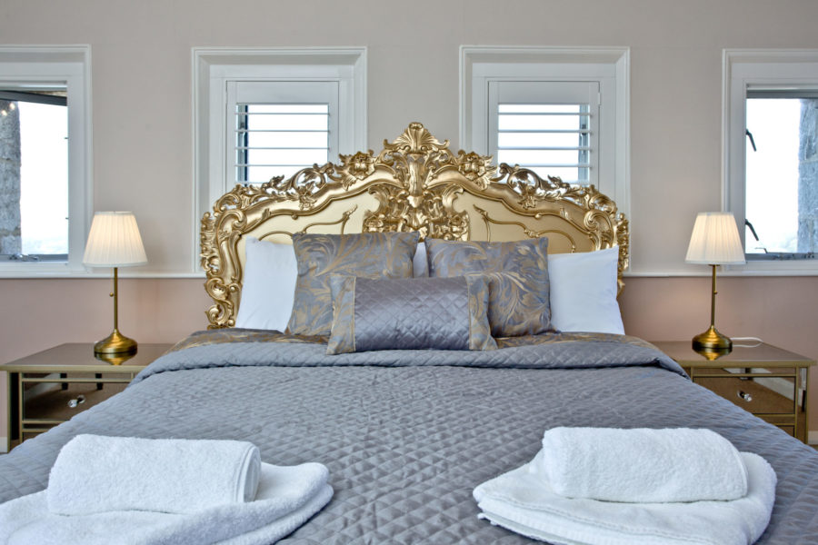 The sumptous king size bed at the top of the tower